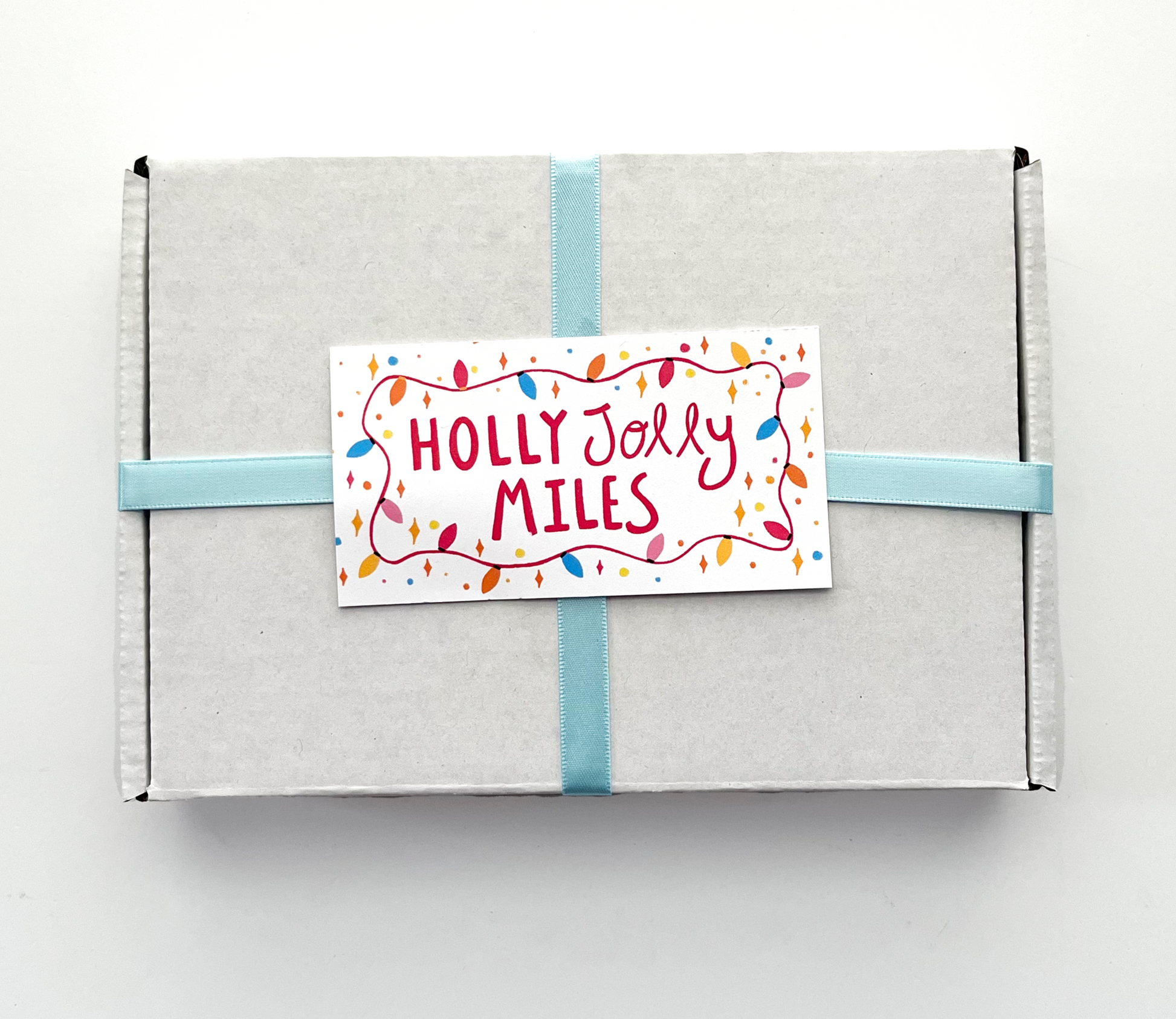 holly jolly miles gift box 