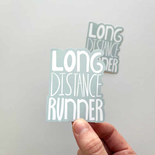 Long Distance Runner Sticker with white text and light blue background