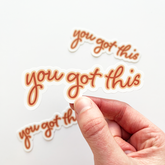 You got this sticker with dark orange text and outlined in a lighter orange red color