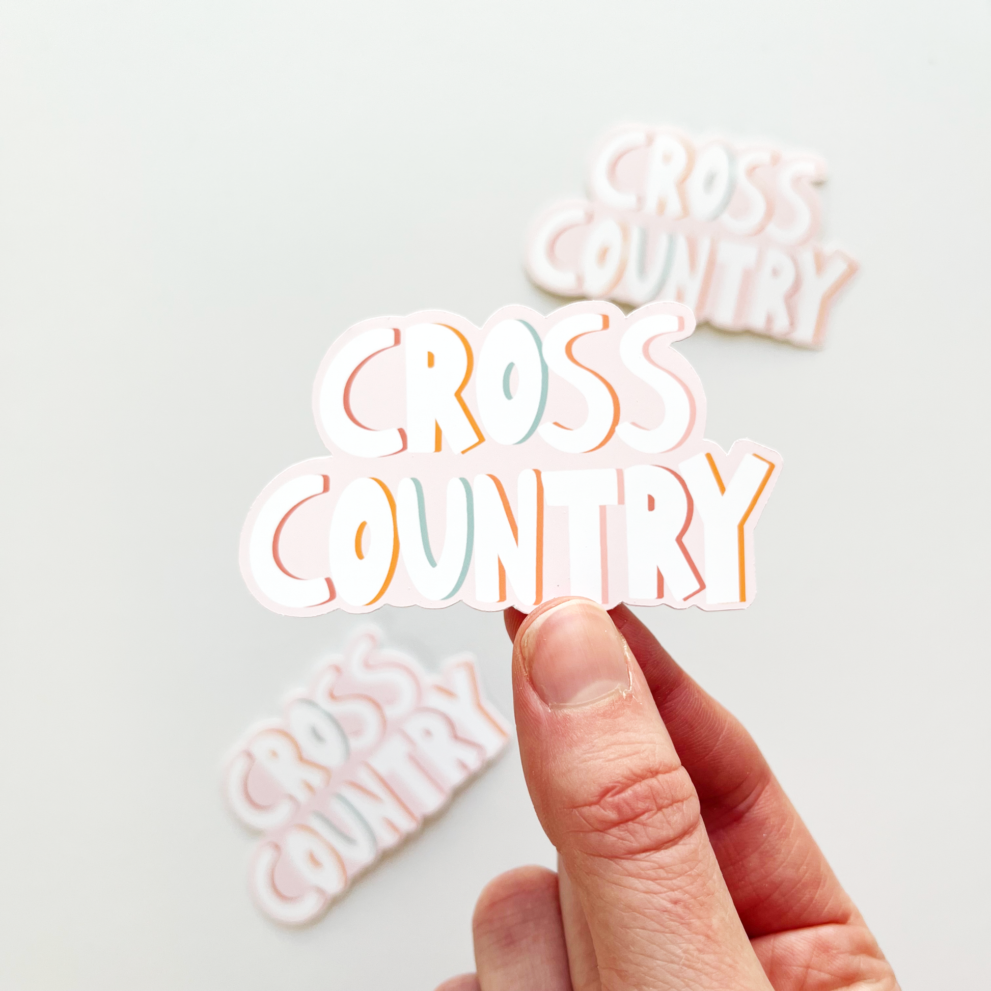 Colorful, pink cross country sticker