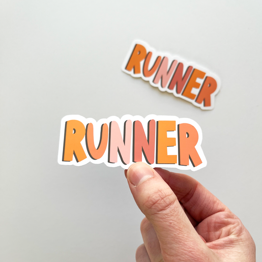 Runner sticker with varying shades of orange, pink and peach 