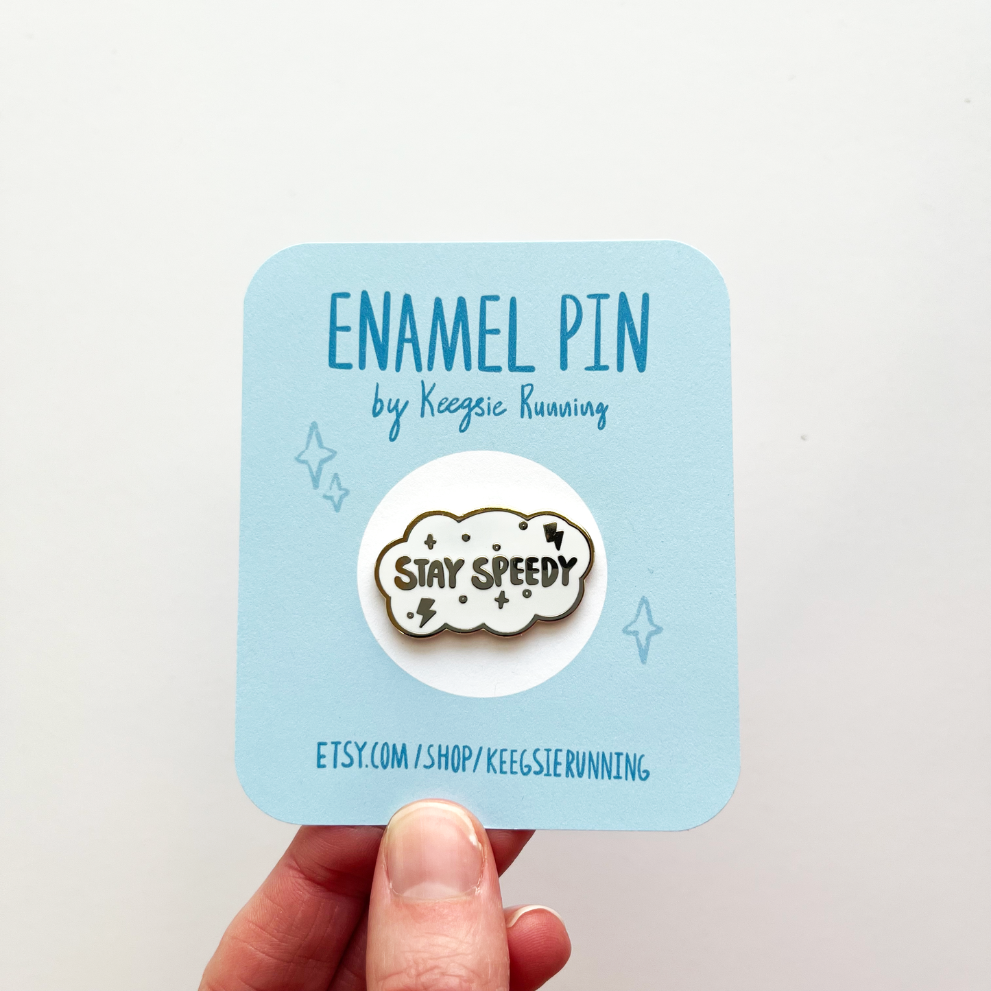 Stay speedy enamel pin on backing card 