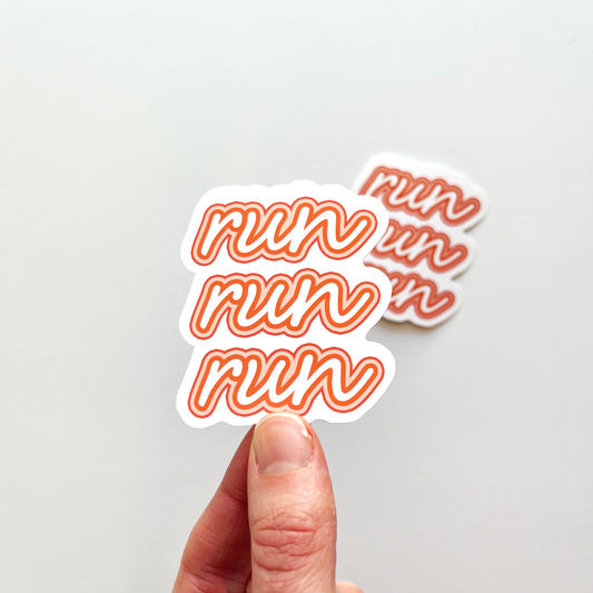 Run run run sticker with stacked repeating white text and outlined in dark orange and light peach