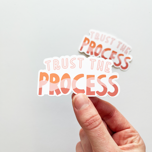 Trust the process sticker in shades of pink, peach and orange